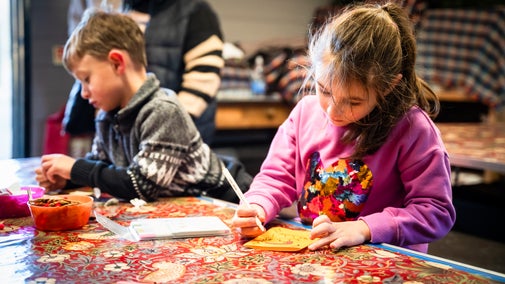 Children engaging in Christmas crafting